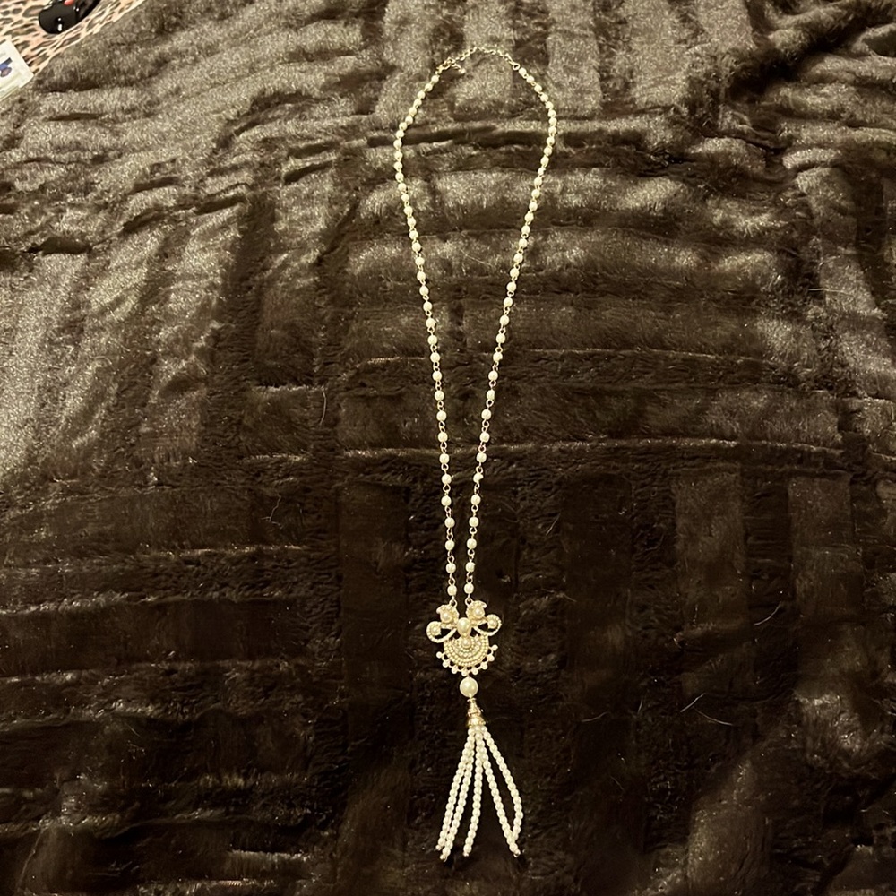 Gold tone pearl pendant